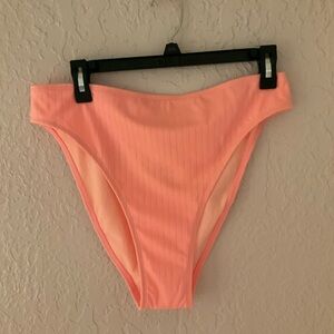 Brand new with tag coral/ peach in color swimsuit bottom size large